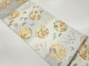 丸文に鳳凰・蝶・花葉模様織出し袋帯
